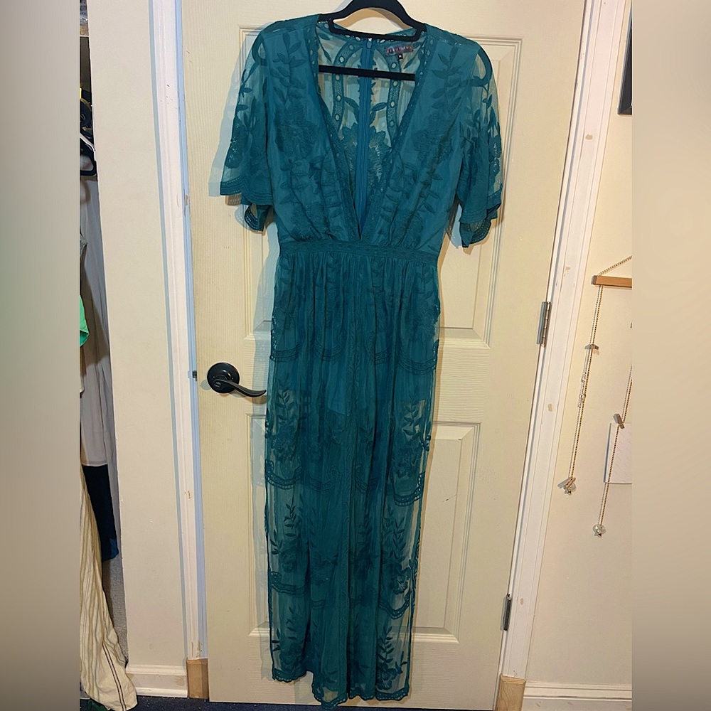 Beautiful size medium turquoise Lacey romper/dress